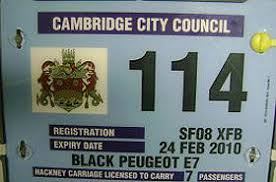 license on the back of a hackney carriage