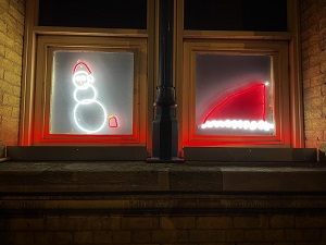 Snowman and Father Christmas hat neon sings