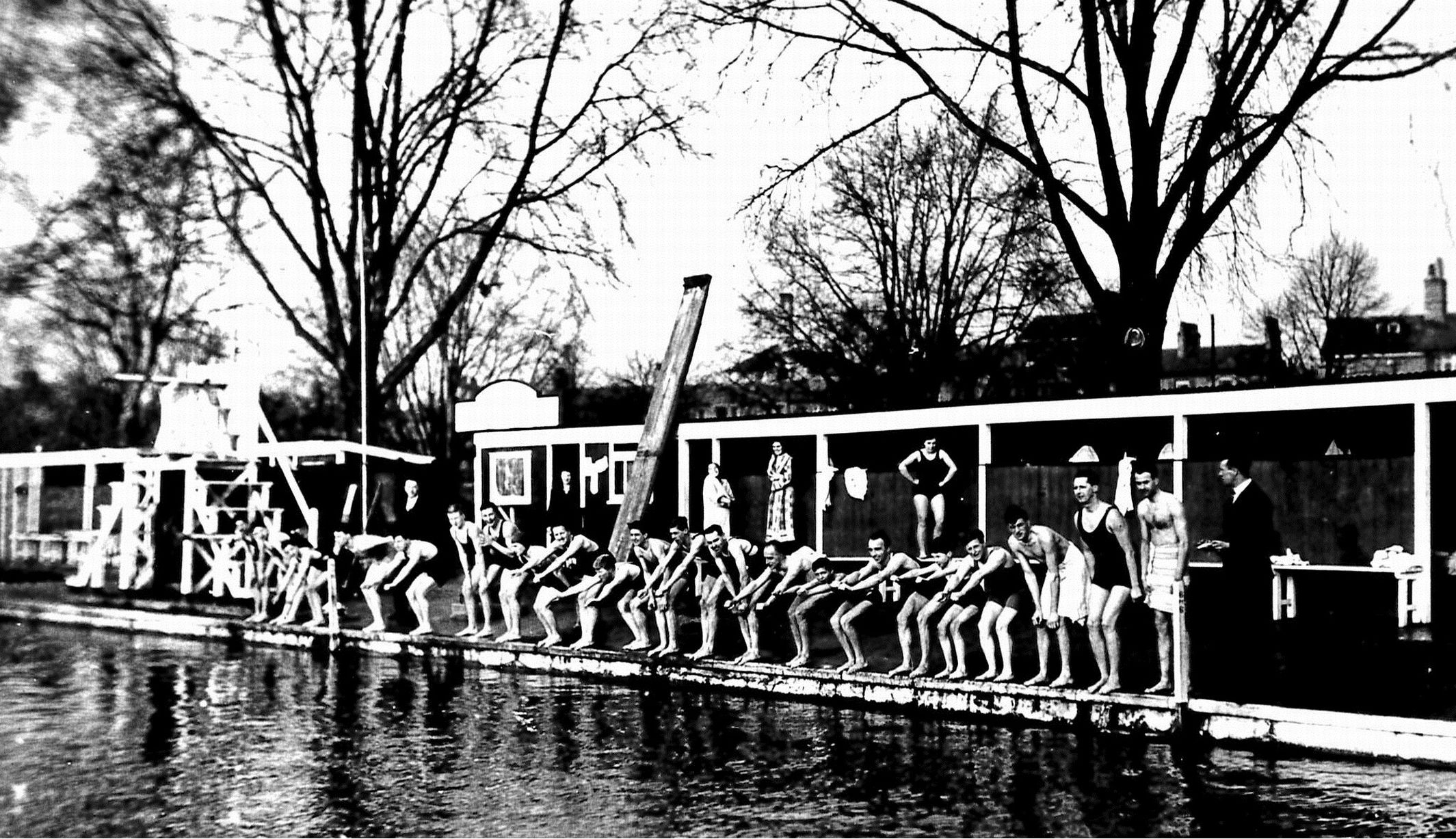 Black and white photo of swimmers from the 1920s