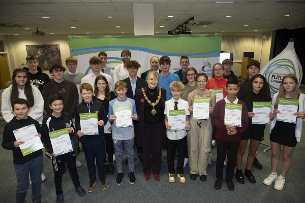 Young people receiving their funding awards, with Mayor of Cambridge, Cllr Jenny Gawthrope Wood centre