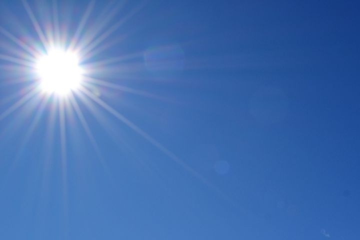 Bright sunshine in a clear blue sky