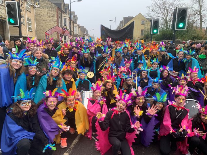 Large group of young people dressed up and having a street party