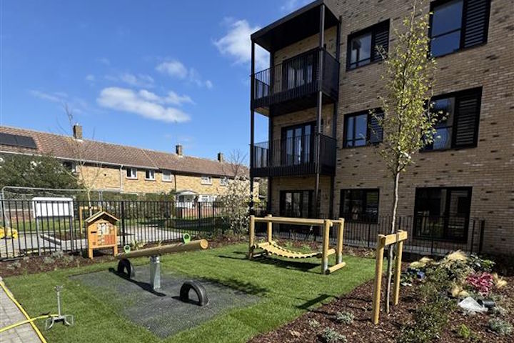 A play area outside newly built council homes